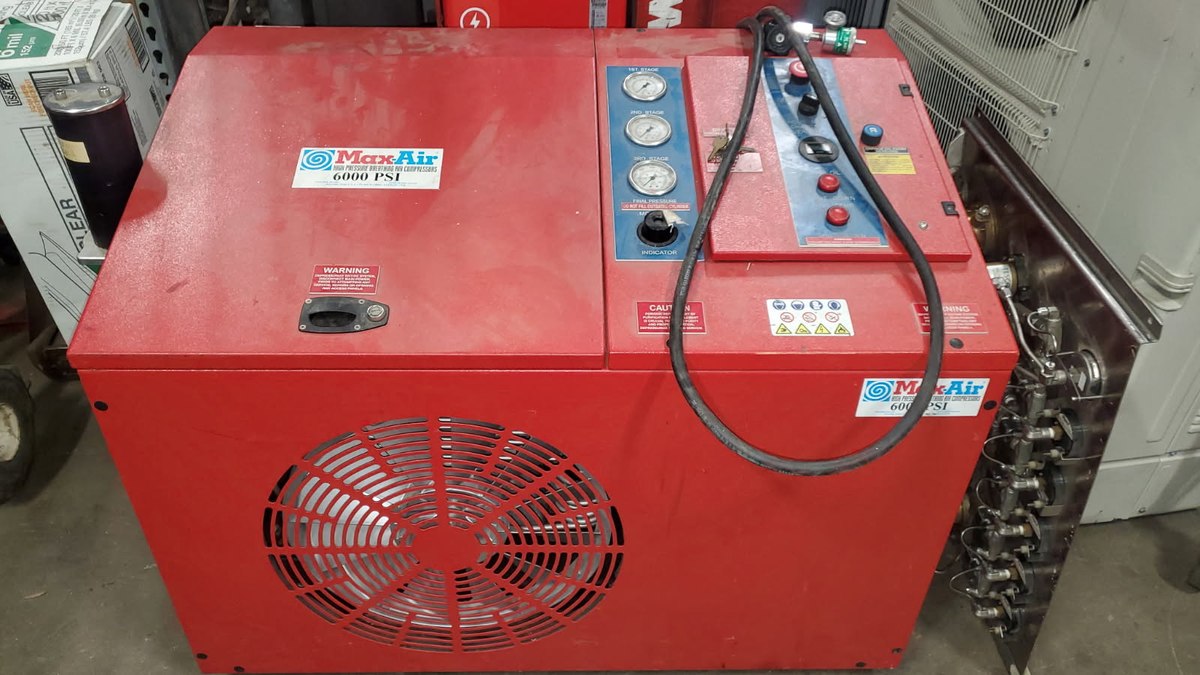 Red Max-Air 6000 PSI breathing air compressor with fill station